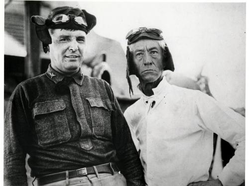 Two men in Pilots Caps and Goggles