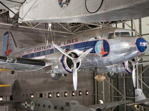 Twin-engined Douglas DC-3 aircraft hanging in museum