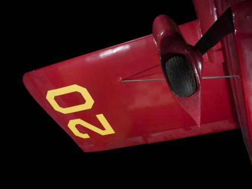 Yellow "20" on underwing and wheel of red Wittman Special 20 "Buster" aircraft