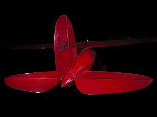 Tail of red Amelia Earhart Lockheed Vega 5B aircraft