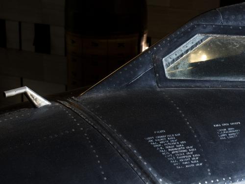 Small bent metal tue sticking out from cockpit of black titanium North American x-15 aircraft