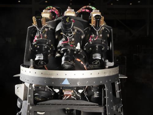 Three camera lenses on top portion of black Ranger spacecraft