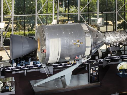 Metal conical command module with cylindrical module in museum