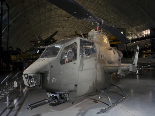 Front of Bell AH-1F Cobra helicopter in museum