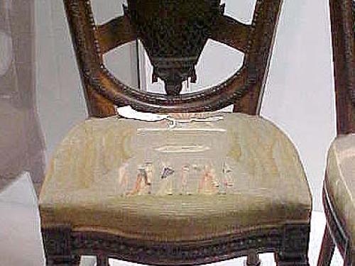 Wooden chair with needlepoint embroidered upholstery of balloon