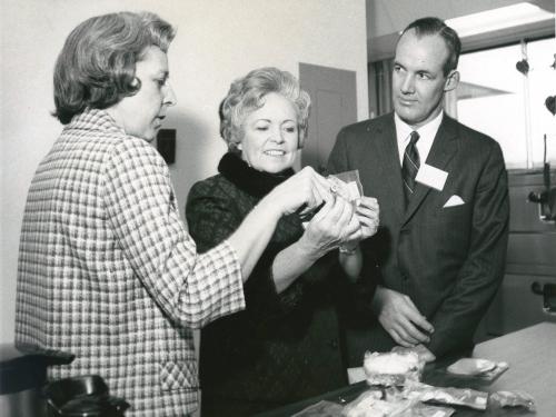 Rita Rapp explains a rehydratable food package to visitors. 