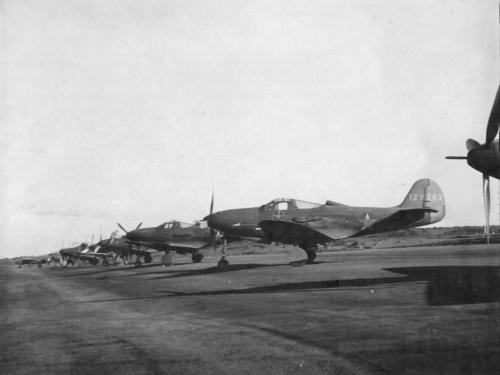 Bell P-39 Airacobras passing through Wideawake Field