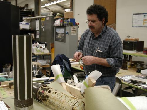 Inspection and conservation evaluation of the Explorer 1 satellite by Matthew Nazarro, specialist at the National Air and Space Museum’s Paul E. Garber Facility.