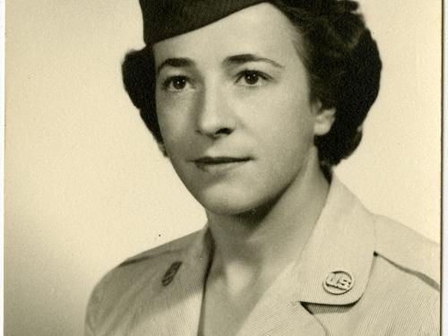 Formal studio portrait of Helen G. James, in uniform.