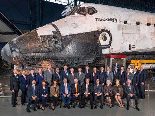 Group photo in front of Space Shuttle Discovery. 