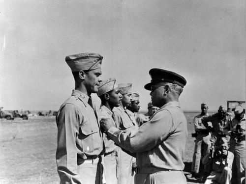 Benjamin O. Davis Sr. pins Distinguished Flying Cross on Davis Jr.