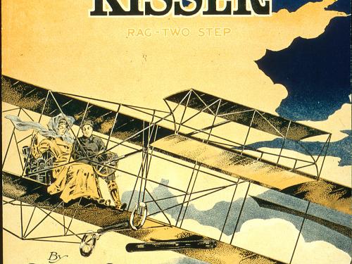 Sheet music cover featuring a biplane. 