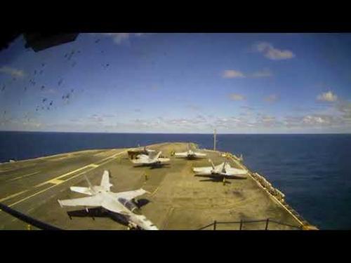 A time lapse video of life aboard an aircraft carrier