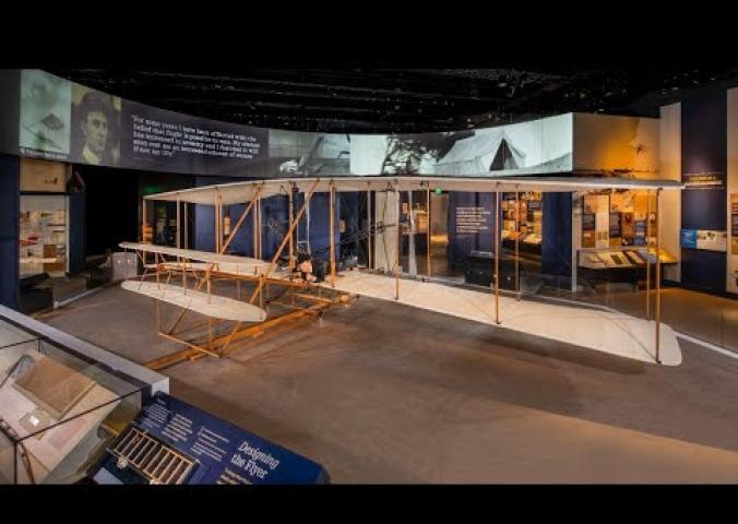 A video showing a flyover of the Wright brothers exhibit gallery, including the original 1903 Wright flyer.