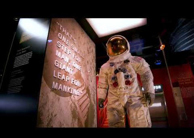 A video of a fly through of the Destination Moon exhibit, which features Command Module Columbia from Apollo 11.
