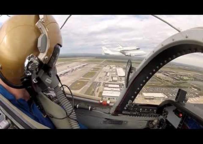 A video montage of Discovery being delivered to the Smithsonian in 2012. Footage includes discovery flying atop a 747 over the national mall and discovery meeting nose to nose with the space shuttle enterprise on the runway.