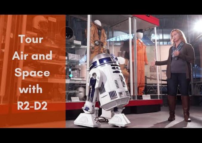 Video of space history curator giving tour of the Udvar-Hazy Center to R2-D2 droid.