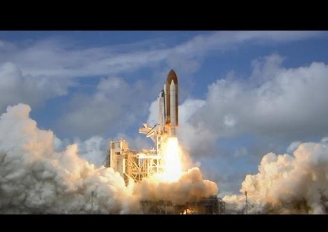 Video interview with curator and clips of space shuttle launches. 