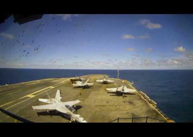A time lapse video of life aboard an aircraft carrier