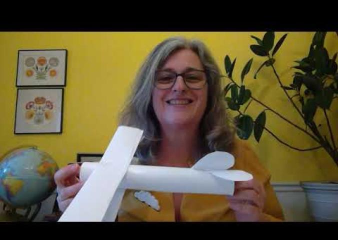 A video about making a model plane using a paper towel tube.