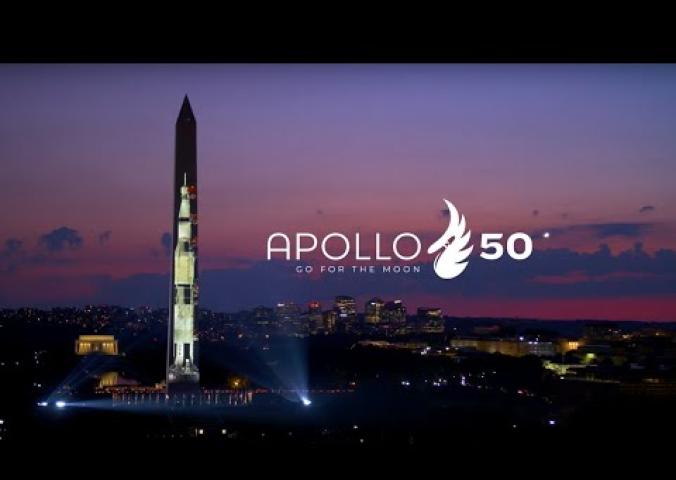 Video of Apollo 11 celebration projection show onto the Washington Monument in Washington, D.C., followed by behind the scenes footage of the event.