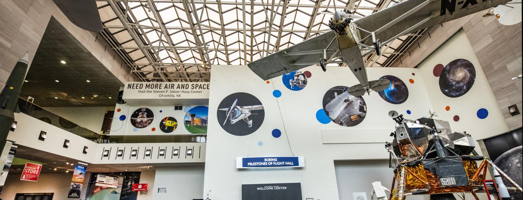 A lunar module and plane are visible in the gallery. 