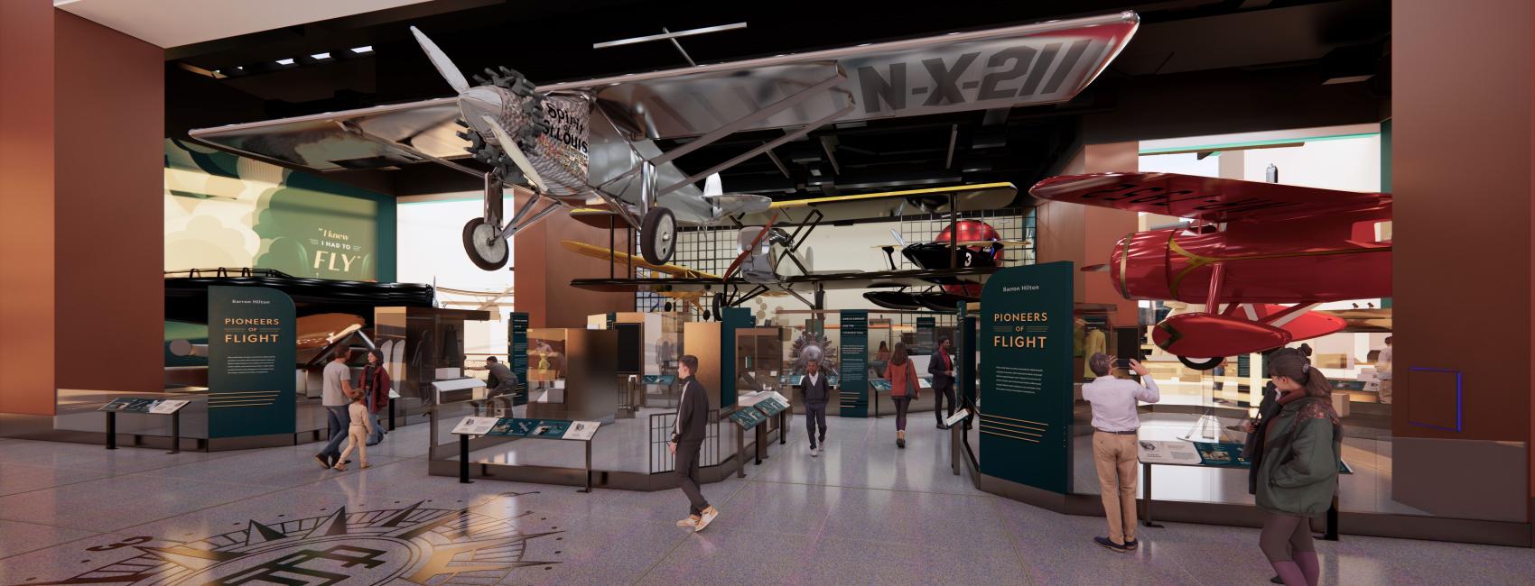 An artist's concept of the Barron Hilton Pioneers of Flight exhibition. In the center is a hanging silver airplane, a red airplane peaks out of the right. There are vertical panels with information on it.