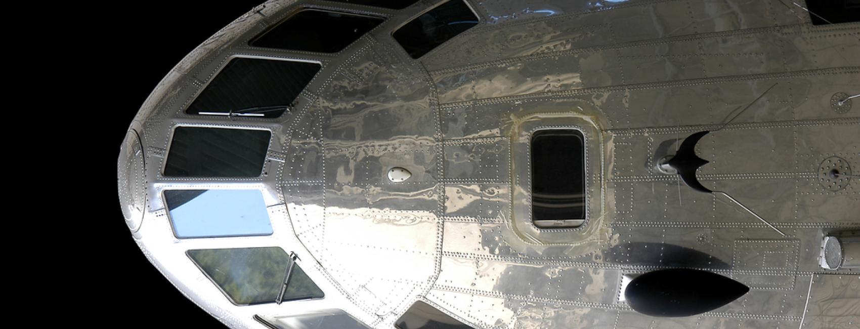 Top view of cockpit and nose of a commercial airplane. 