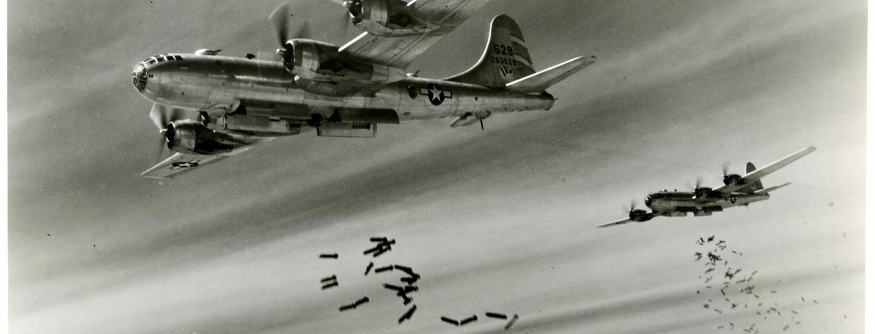 Two aircraft drop bombs