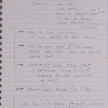 page of handwritten text in spiralbound notebook