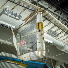 Close up image of an aircraft hanging in a gallery 