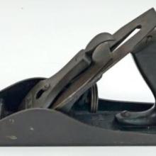 A close-up of of a Stanley No. 5 hand plane tool from circa 1900.