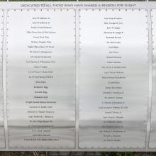 Metal plaque listing Wall of Honor Honorees.