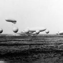 A photograph of an entire lighter-than-air fleet in flight at the same time.