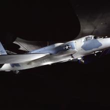 A plane with blue and white camouflage and a U.S. Air Force logo. 