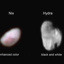 Two fuzzy celestial bodies. The one of the left is reddish-white and the one of the right is black and white.