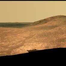 A panoramic image of a valley on Mars.