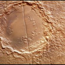 A large circular shape on the surface of Mars that appears smoother than the ground around it.