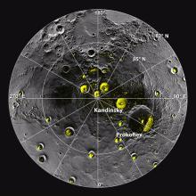 A view of mercury's north pole. Polar deposits are noted by yellow.