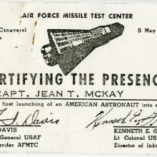 Card with an image of a Mercury capsule stating that it is certifying the present of Capt. Jean T. McKay, with signatures at the bottom.