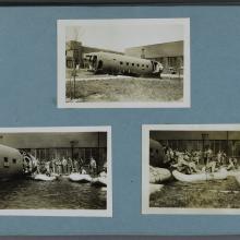 Three black and white photographs on a light blue scrapbook page. Top center photograph of an airplane fuselage. Bottom left photograph of women standing on the ground outside the fuselage. Bottom right photograph of women in boats on the ground outside the fuselage.