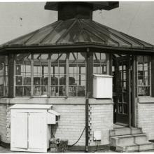 Black and white photo of glass enclosed control tower