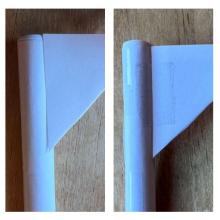 A composite image of four pictures. The far right shows a paper rocket with two fins detached. The second and third picture close ups of attaching the fin. The fourth is the completed paper rocket.