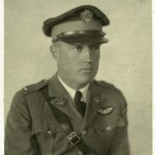 Portrait of a man wearing a military uniform with a hat 