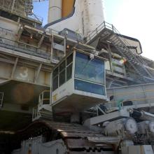 Space Shuttle on a launch pad while on a mobile crawler.