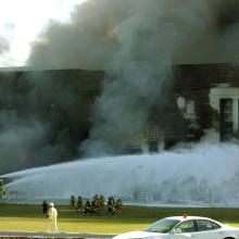 Foam 331 seen shortly after its arrival at the impact site, spraying foam from its bumper and roof turrets.