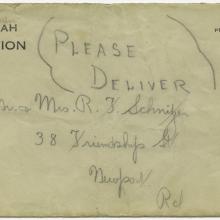 The front of an addressed weathered enveloped with the words please deliver written on the front in big letters.