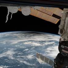 A shadow is evident on the Earth viewing the eclipse from space. 