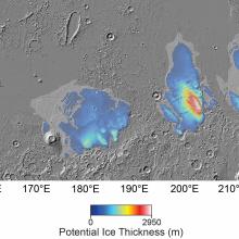 Overhead view of the surface of Mars with portions color coded blue through red to indicate thickness.