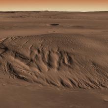 The surface of Mars, appears to be a sandy surface or sand dunes. 